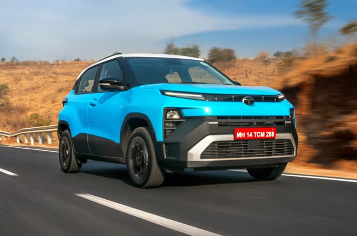 2026 Tata Punch review front right side driving on road 