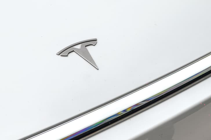 Tesla Model Y road test review Tesla logo
