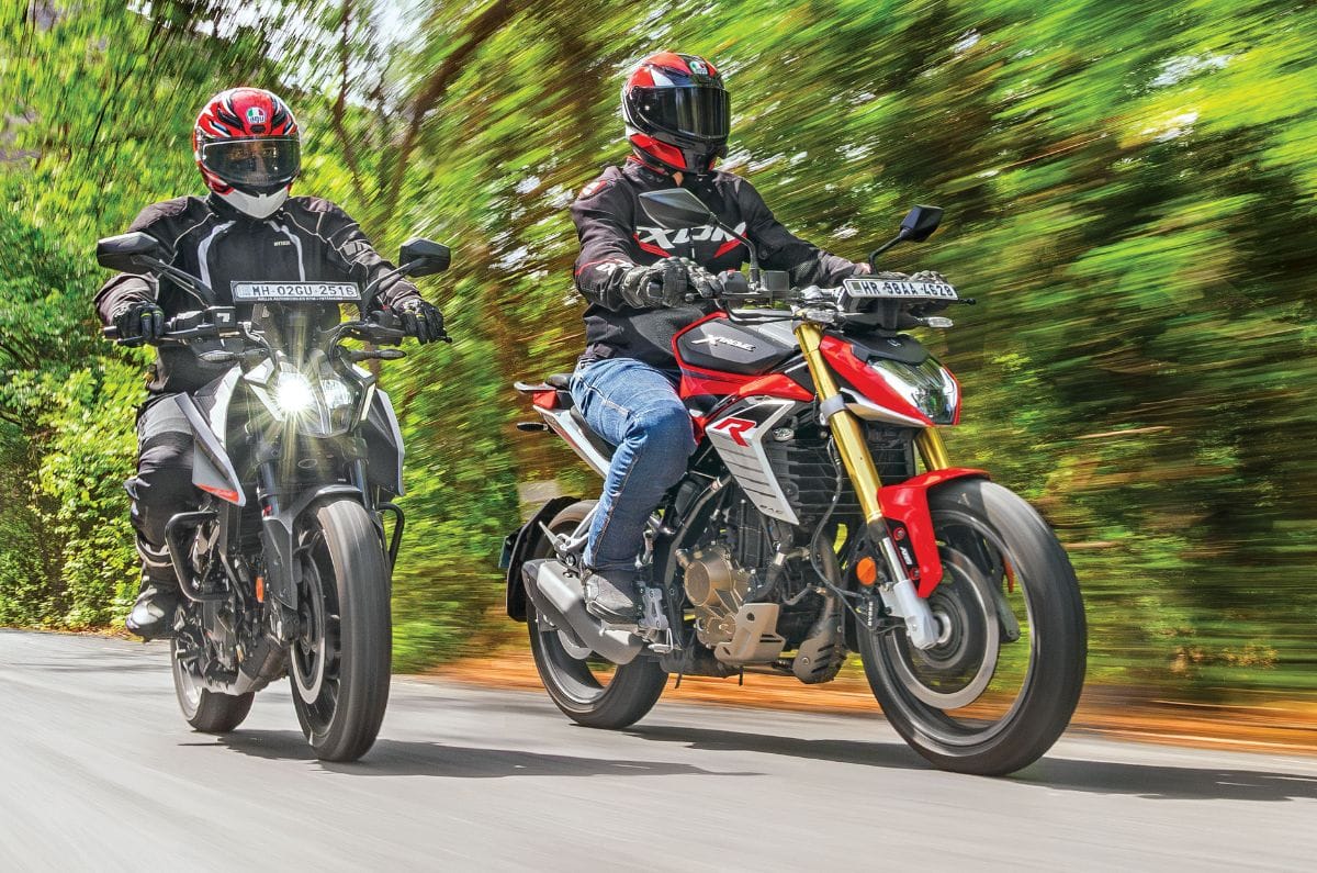KTM 250 Duke and Hero Xtreme 250R front side riding shot on road